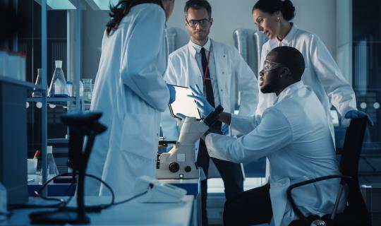 Four scientists in lab