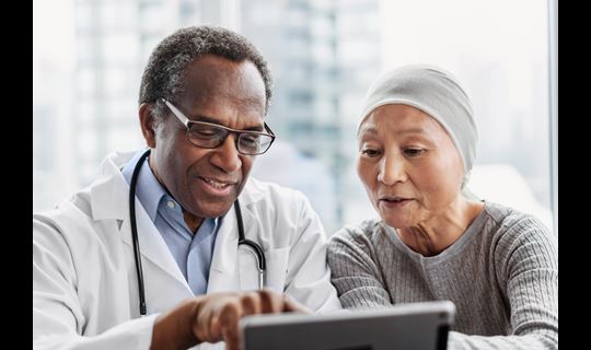 Male doctor with patient
