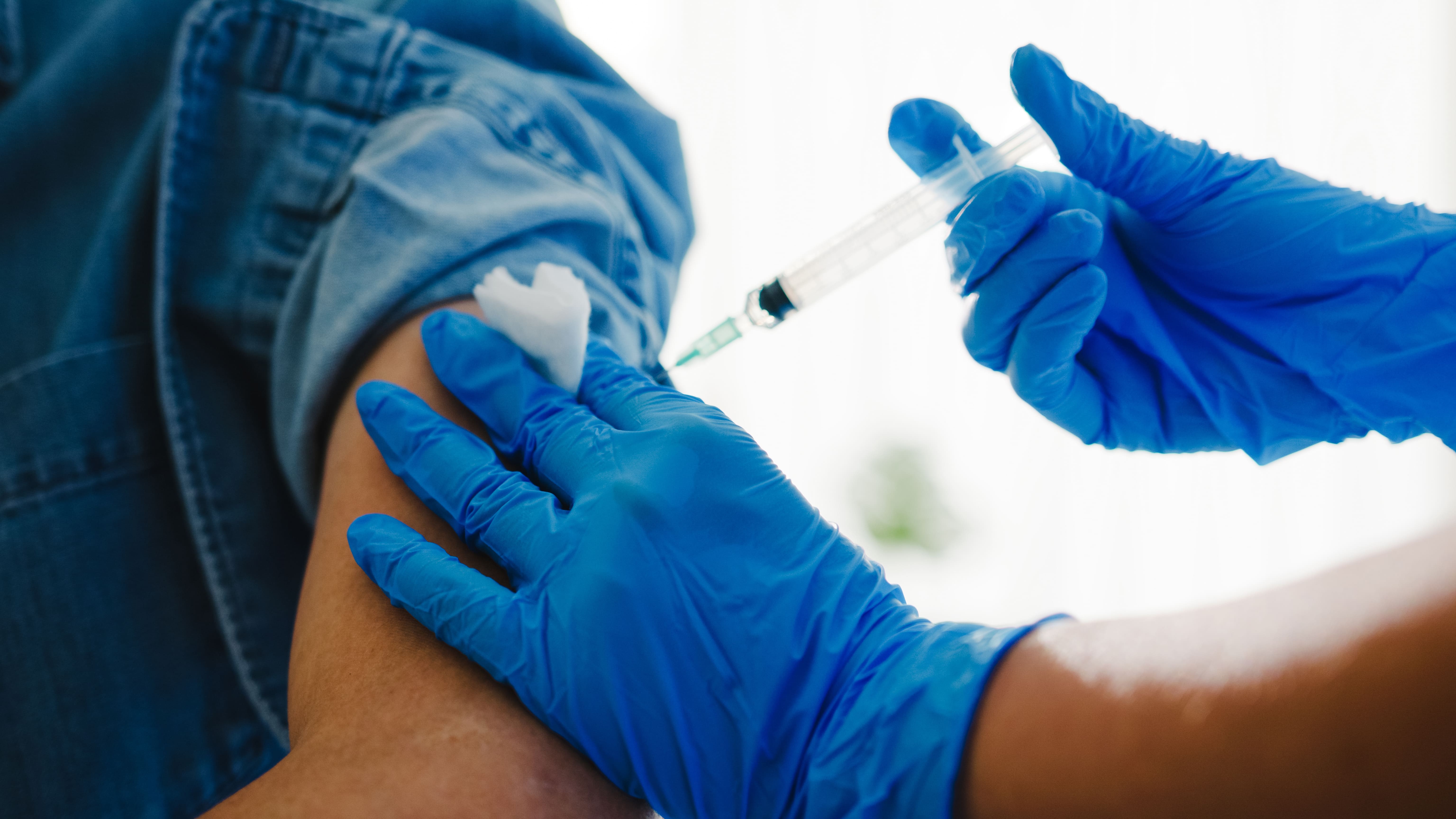 Male patient receiving vaccination