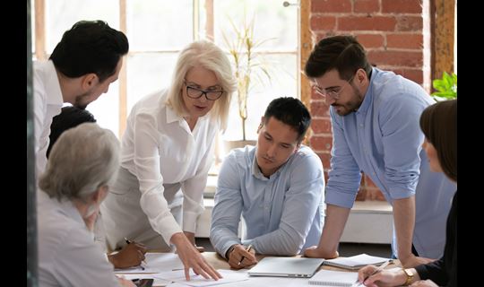 Group of associates talking