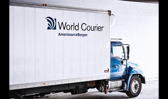 A large World Courier truck, or lorry.